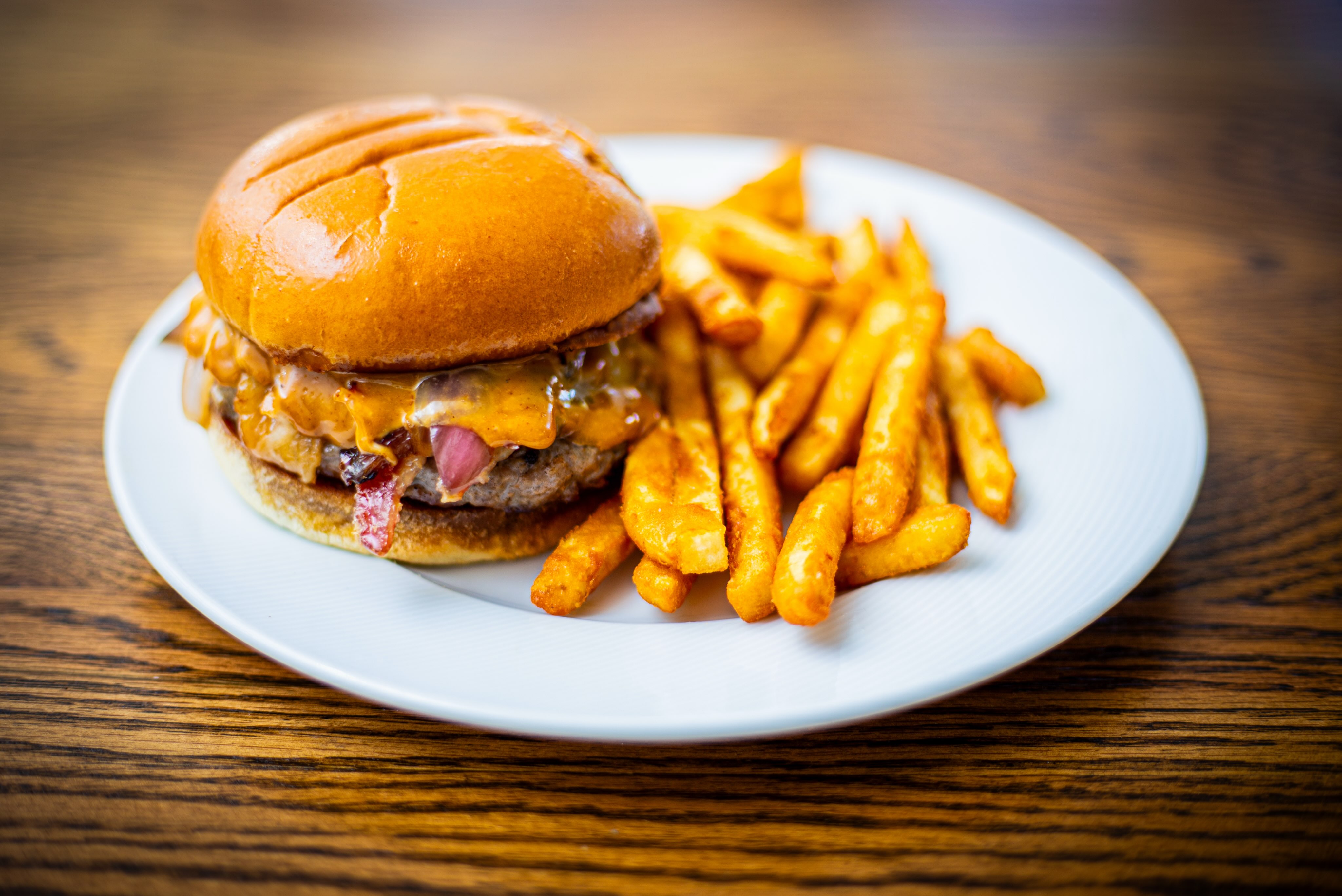 🍔 NEW Burger Special: The Sriracha Bourbon Burger is here! 🌶️🥃🔥